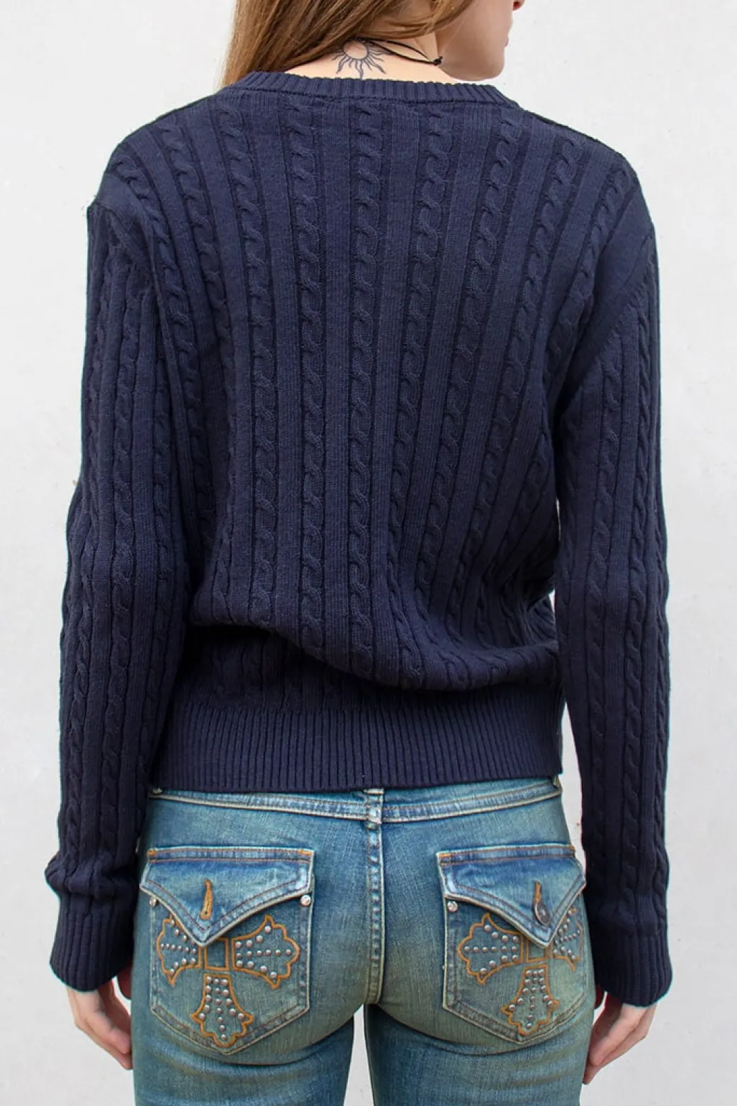 Maglione scollo a V a trecce