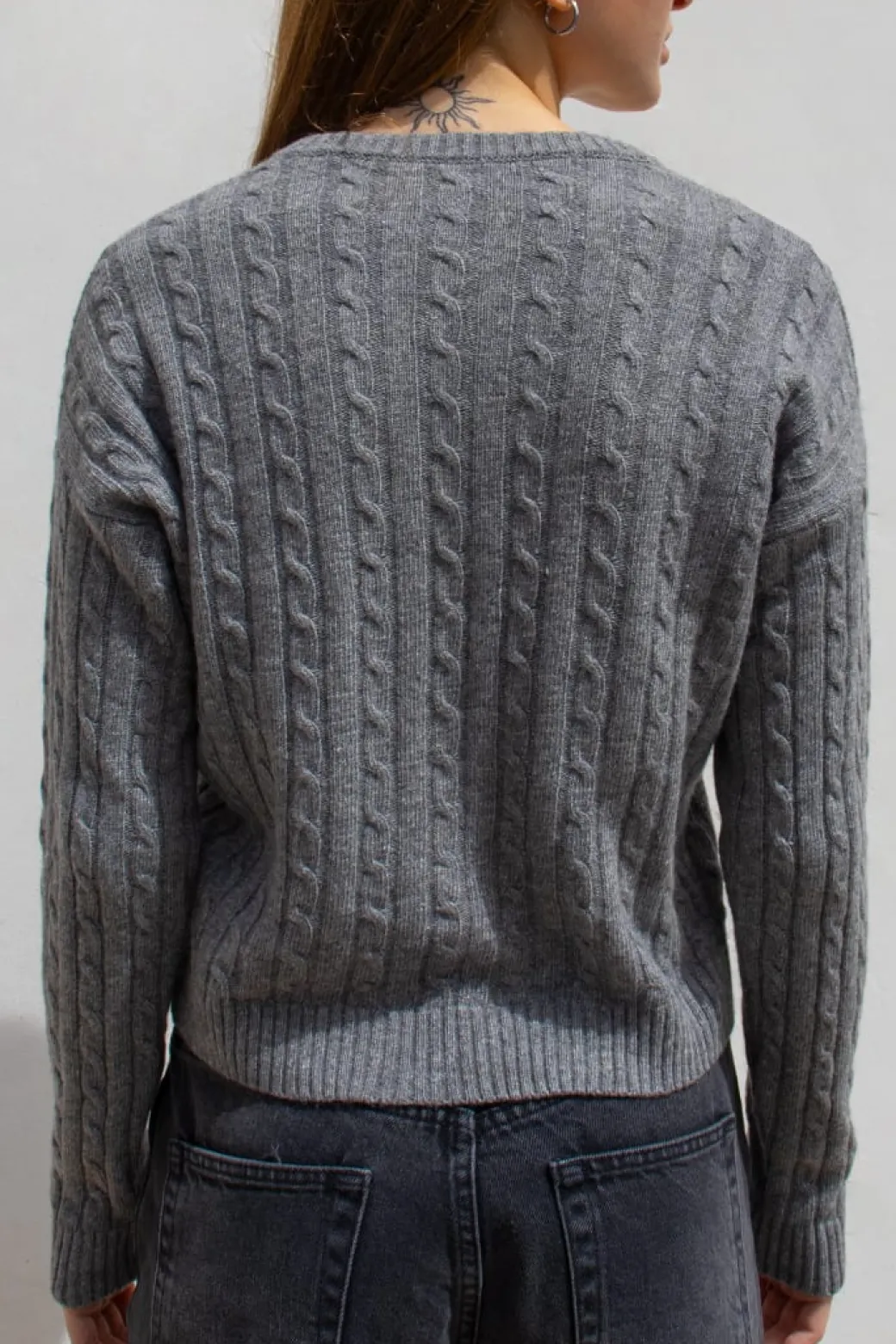 Maglione trecce scollo a V